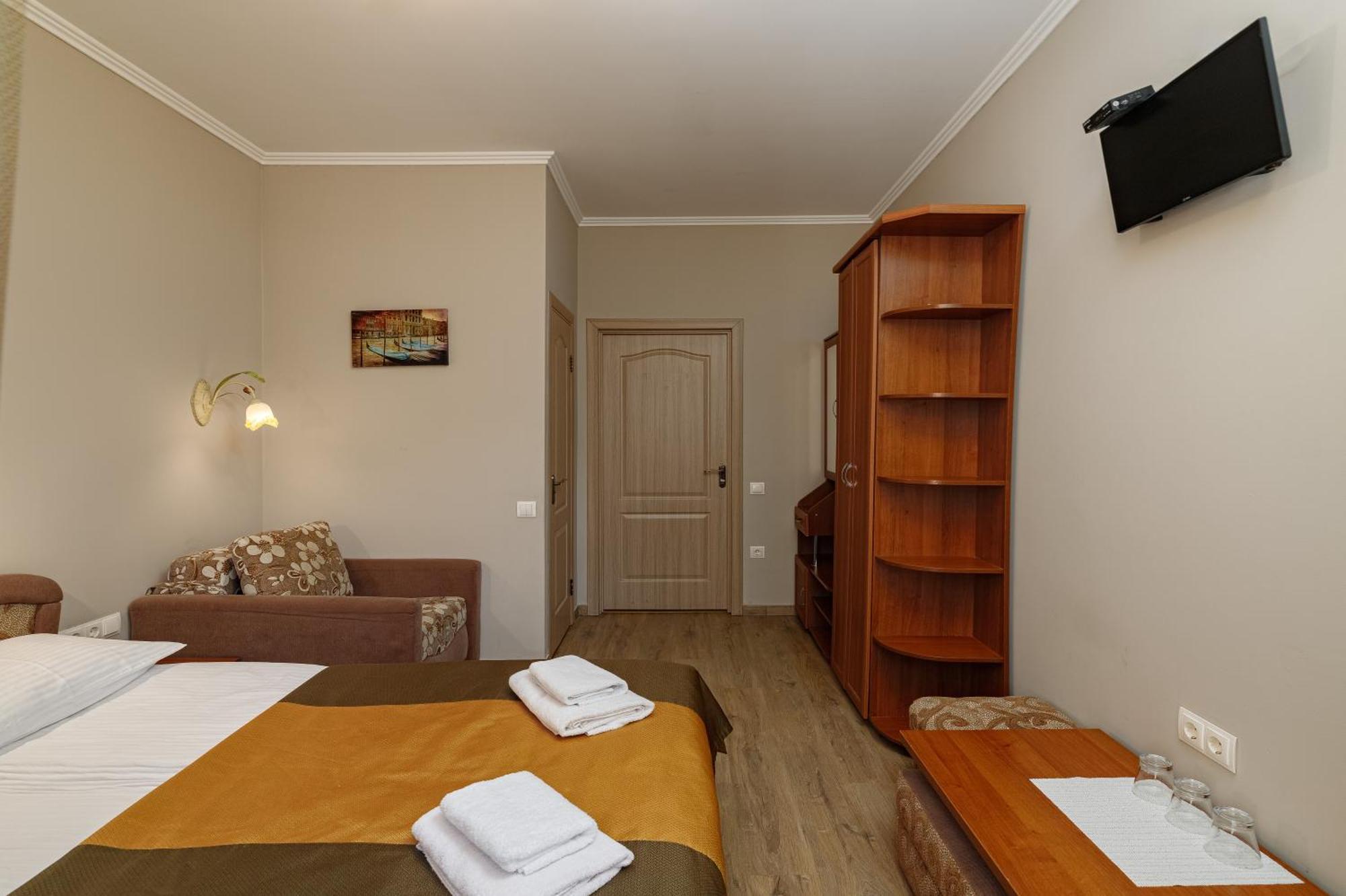 Hotel Kaiser Econom Lemberg Zimmer foto
